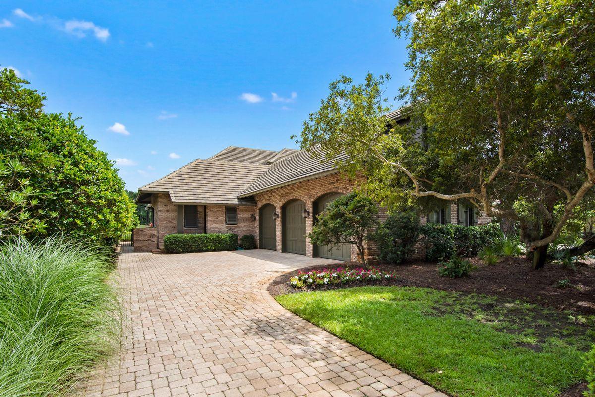 2955 Pine Valley Road Miramar Beach, FL 32550 - Photo 33 of 33 a front view of a house with a garden and yard