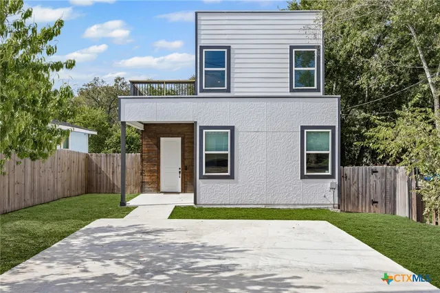 a front view of house with yard