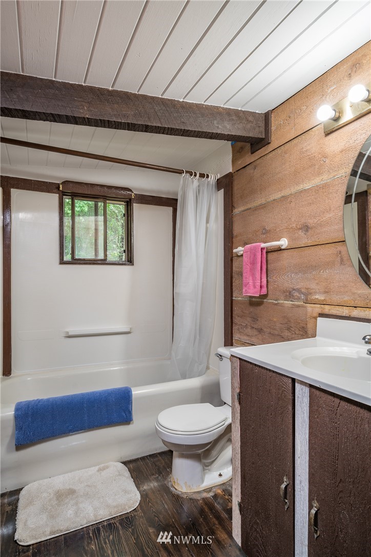 611 Shark Reef Road Lopez Island, WA 98261 - Photo 8 of 13 a bathroom with a toilet and a shower