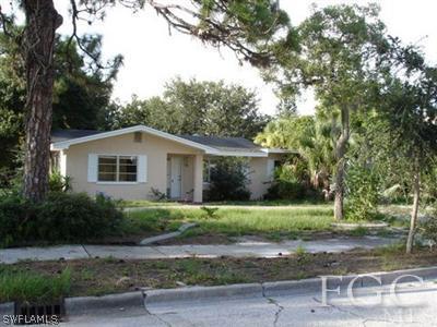 432 Valencia Road Venice, FL 34285 - Photo 1 of 1 a view of a yard in front of a house with large tree