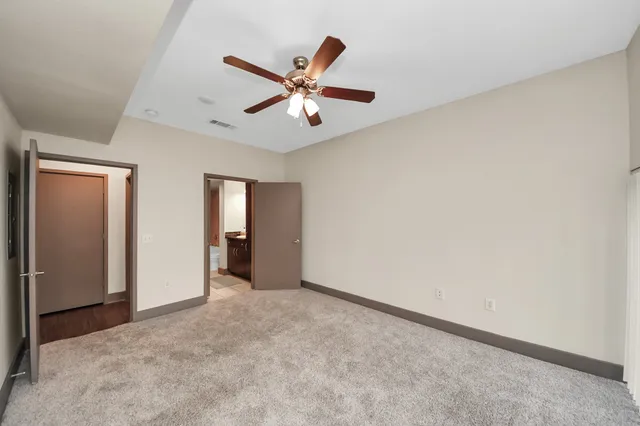 a view of washer and dryer with wooden floor