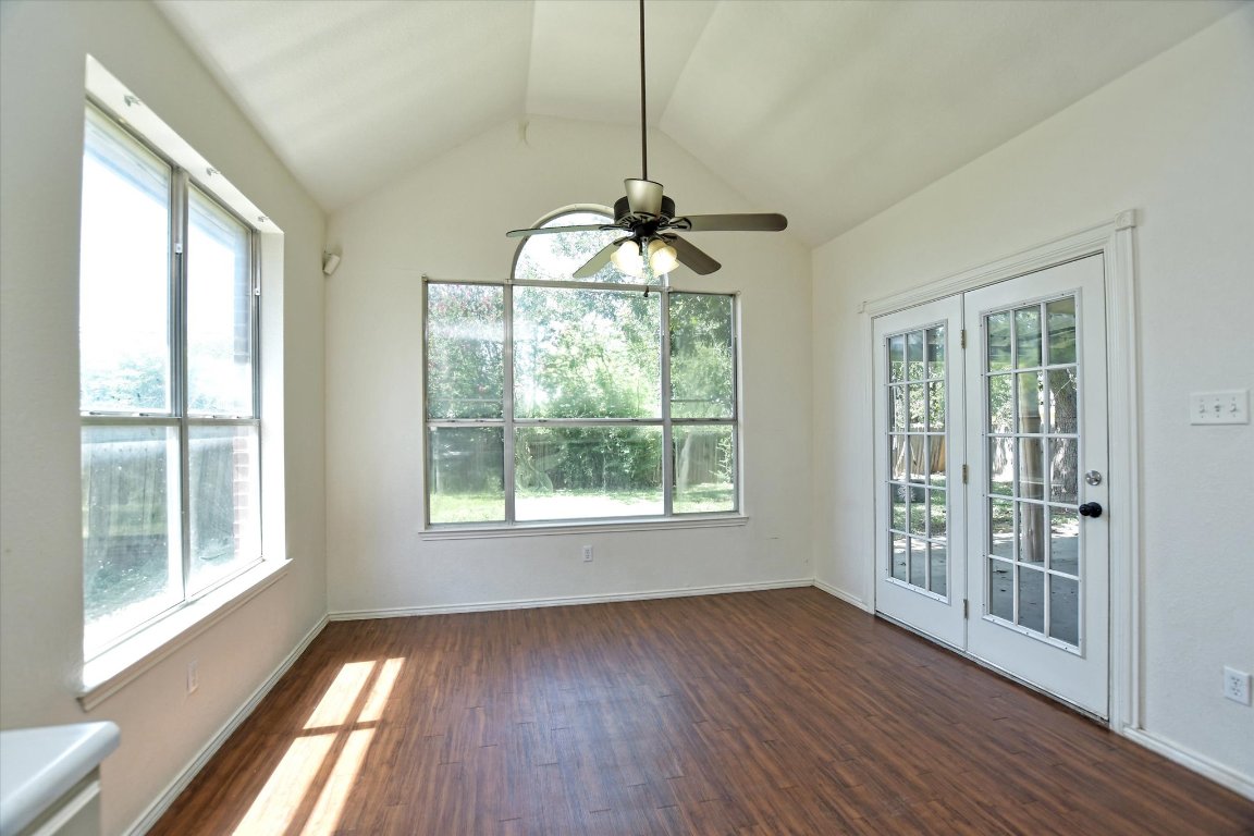 301 Gulfstream Drive Georgetown, TX 78626 - Photo 17 of 35 a view of an empty room with wooden floor and a window