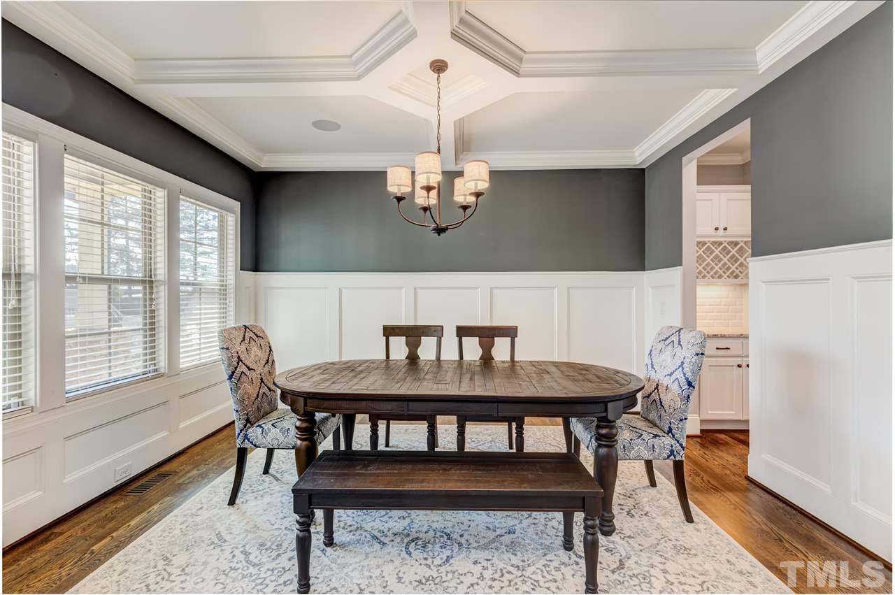 101 Pineland Circle Raleigh, NC 27606 - Photo 2 of 21 a view of a dining room with furniture window and wooden floor