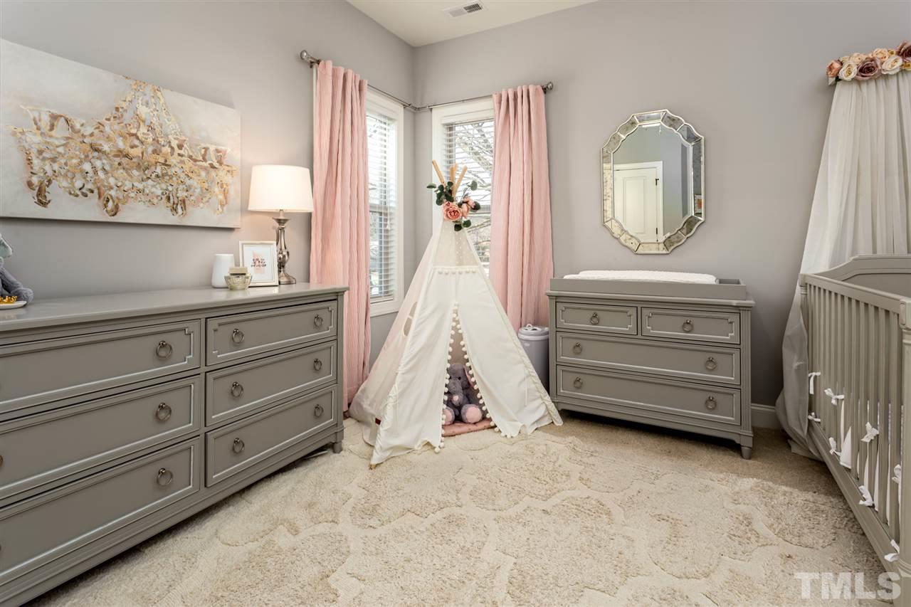 101 Pineland Circle Raleigh, NC 27606 - Photo 13 of 21 a view of hall way with furniture and mirror on the dresser