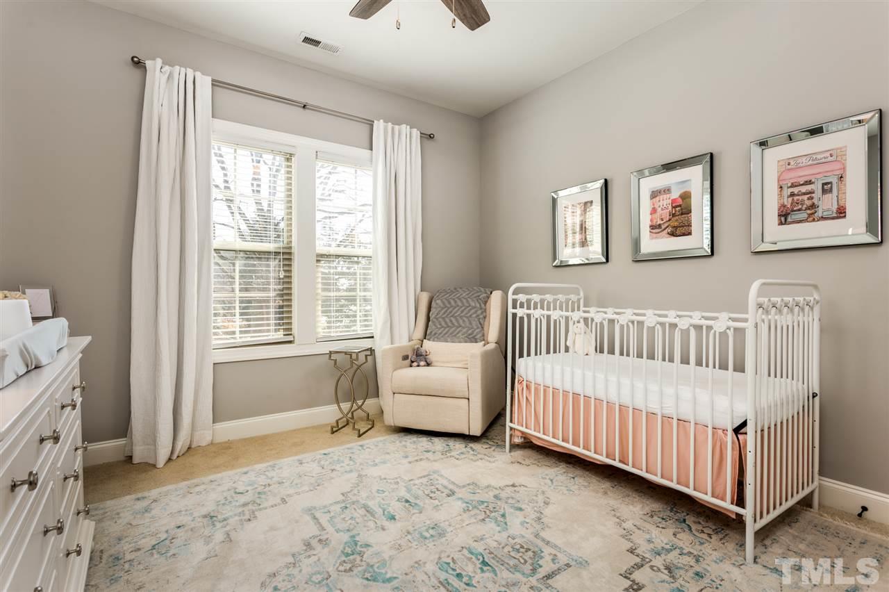 101 Pineland Circle Raleigh, NC 27606 - Photo 15 of 21 a bedroom with a bed and a window
