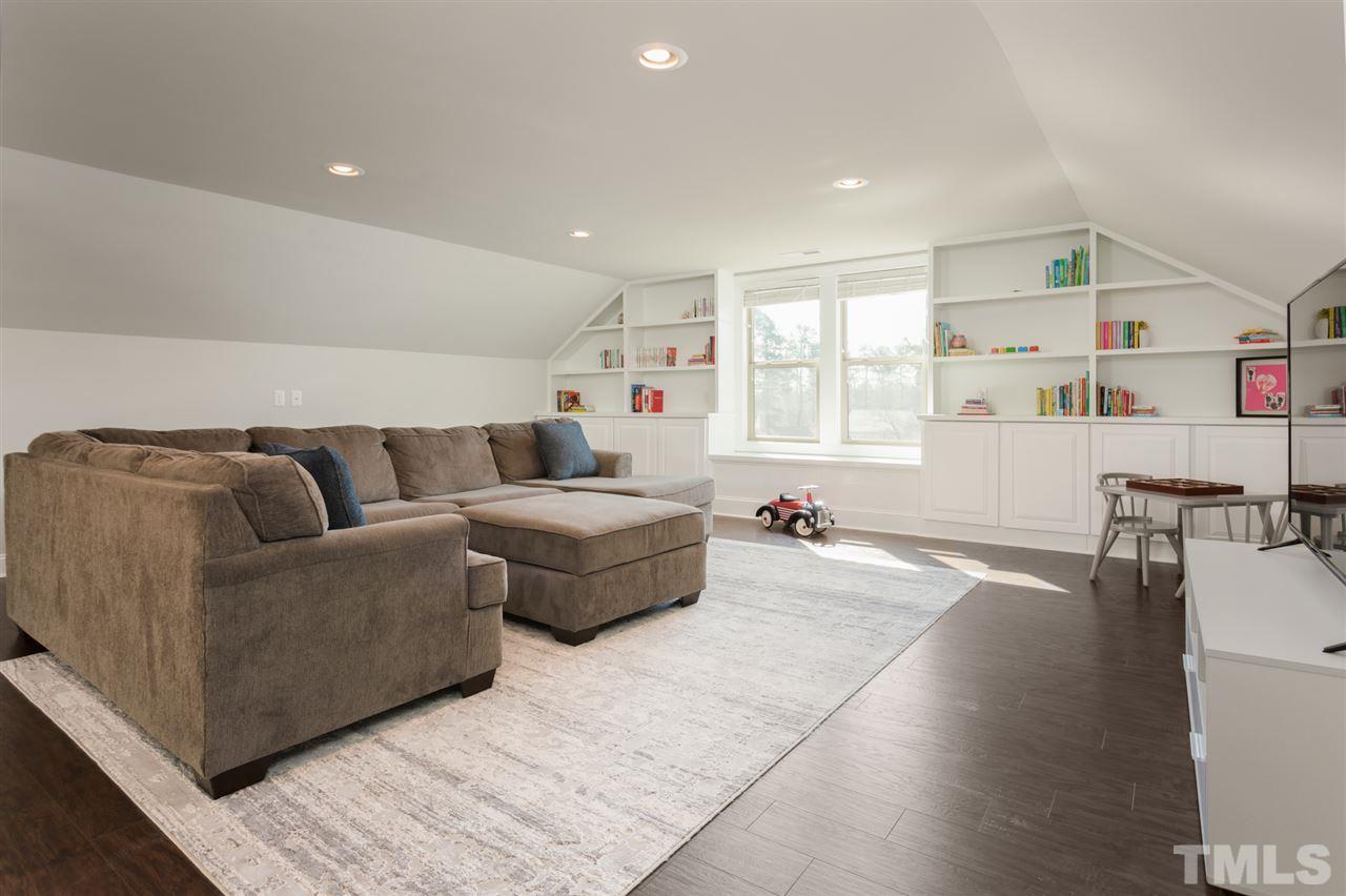 101 Pineland Circle Raleigh, NC 27606 - Photo 18 of 21 a living room with furniture and a window