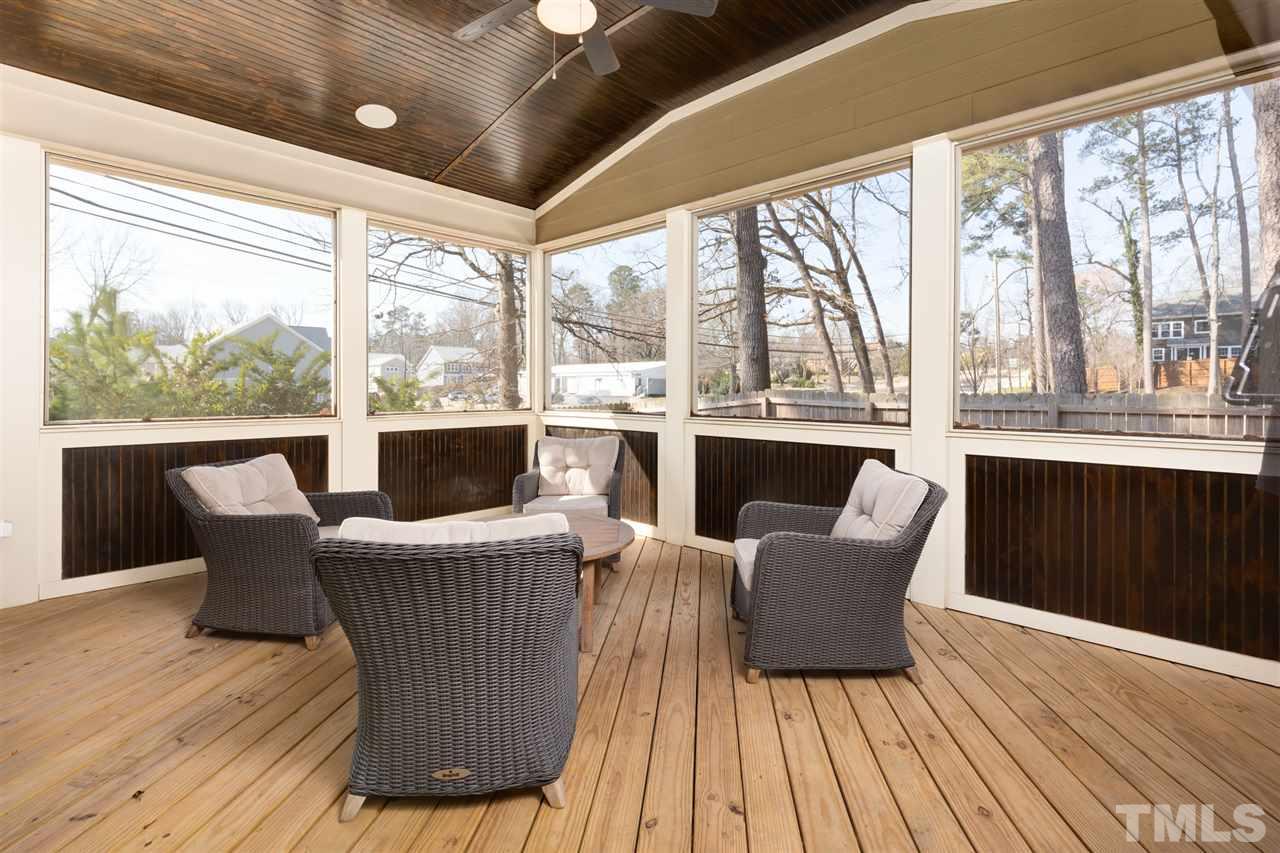 101 Pineland Circle Raleigh, NC 27606 - Photo 20 of 21 a view of a dining room with furniture window and wooden floor