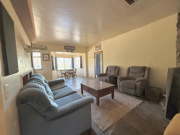 a living room with furniture and a couch