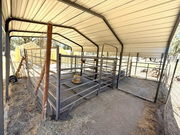 a view of an empty room with windows