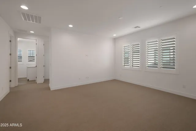 an empty room with windows