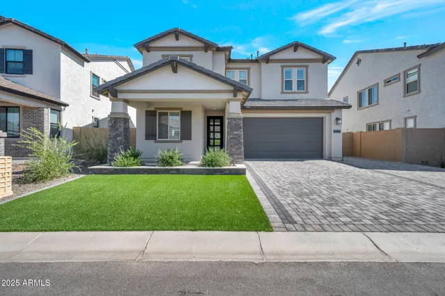 a view of a swimming pool with an outdoor seating and a yard
