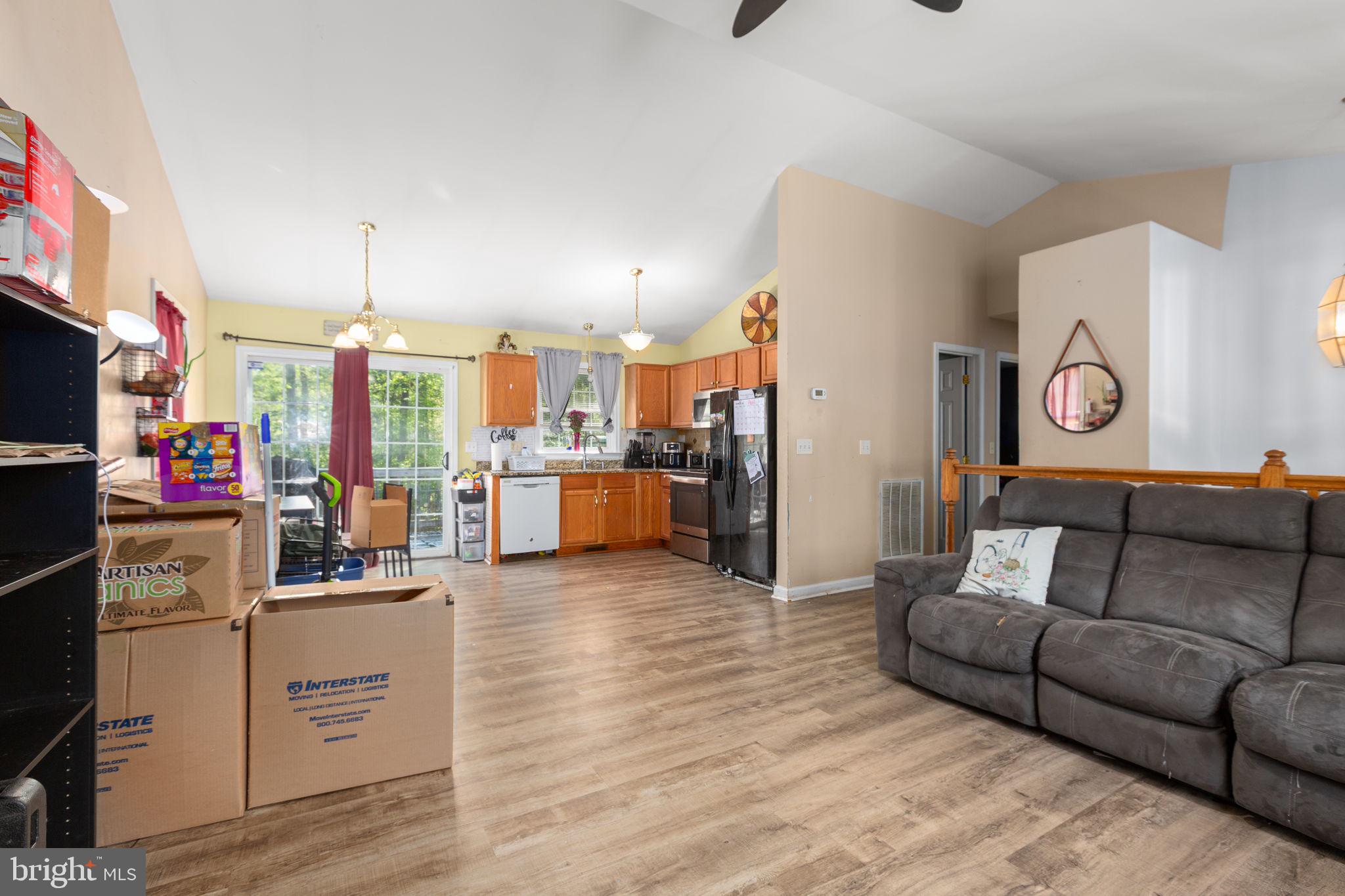 877 Campers Lane Ruther Glen, VA 22546 - Photo 3 of 13 a living room with furniture and kitchen view