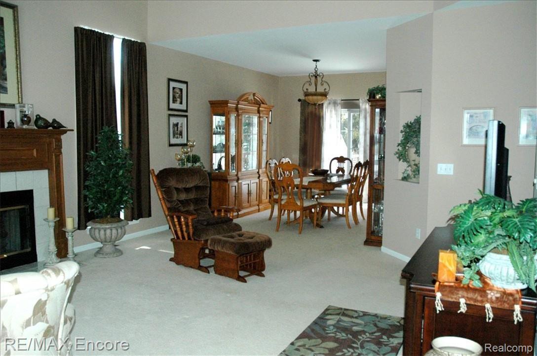 16307 Quail Ridge Court Fenton, MI 48430 - Photo 5 of 24 Living room open to dining rm