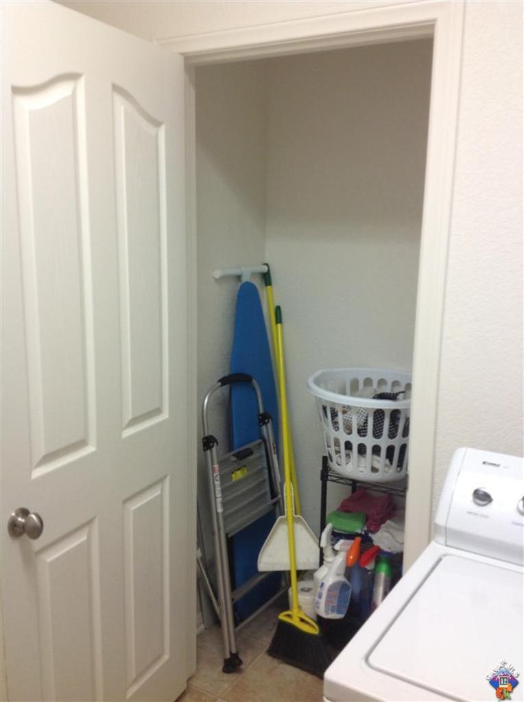 42909 Edson Avenue Lancaster, CA 93536 - Photo 12 of 14 a view of storage and utility room with toys