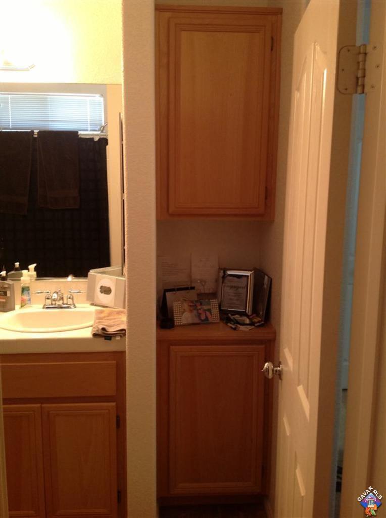 42909 Edson Avenue Lancaster, CA 93536 - Photo 8 of 14 a bathroom with a sink and a mirror