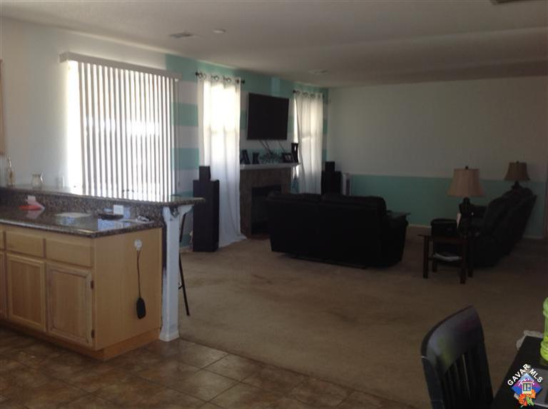 42909 Edson Avenue Lancaster, CA 93536 - Photo 10 of 14 a room with cabinets and furniture