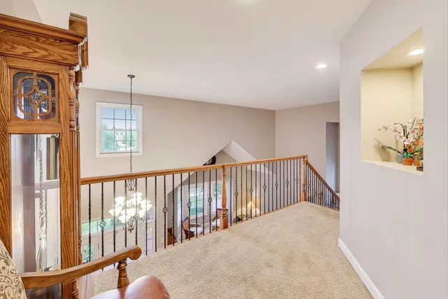 a view of a hallway with windows