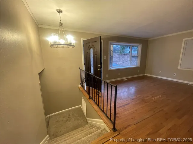 a view of a hallway with entryway