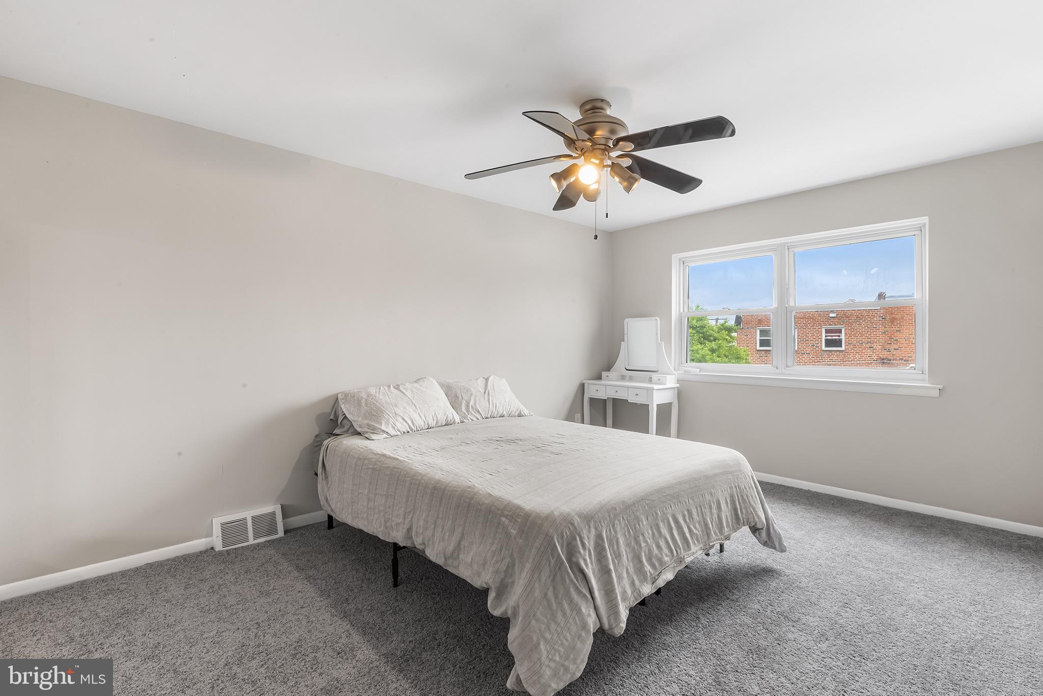 12100 Ranier Road Philadelphia, PA 19154 - Photo 16 of 32 a bedroom with a bed and a window