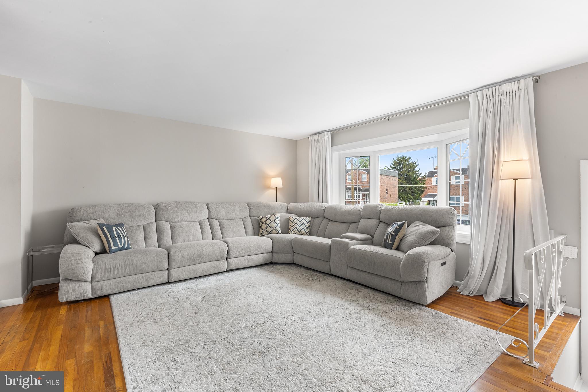 12100 Ranier Road Philadelphia, PA 19154 - Photo 3 of 32 a living room with furniture and a large window
