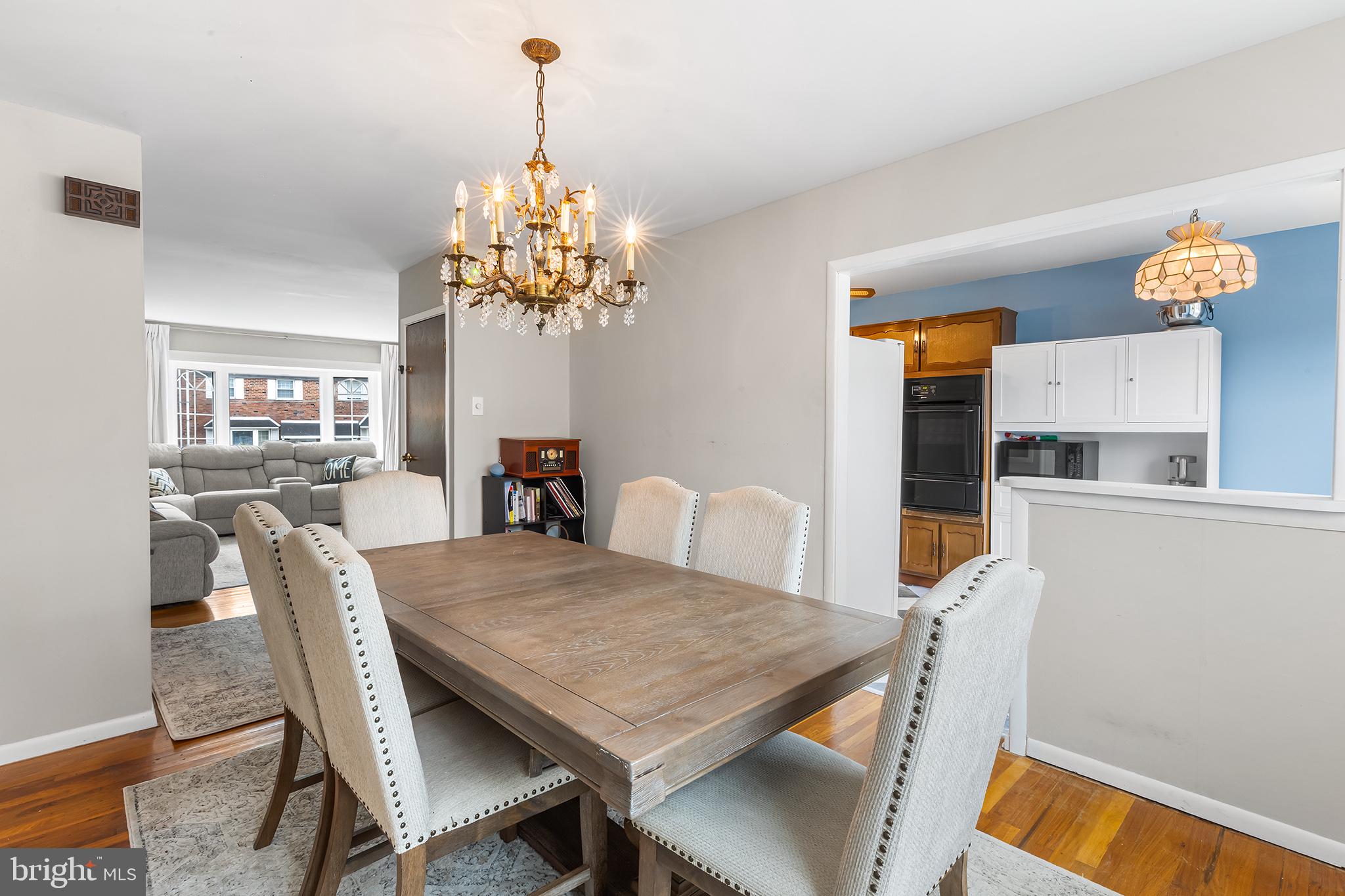 12100 Ranier Road Philadelphia, PA 19154 - Photo 7 of 32 a view of a dining room with furniture and wooden floor