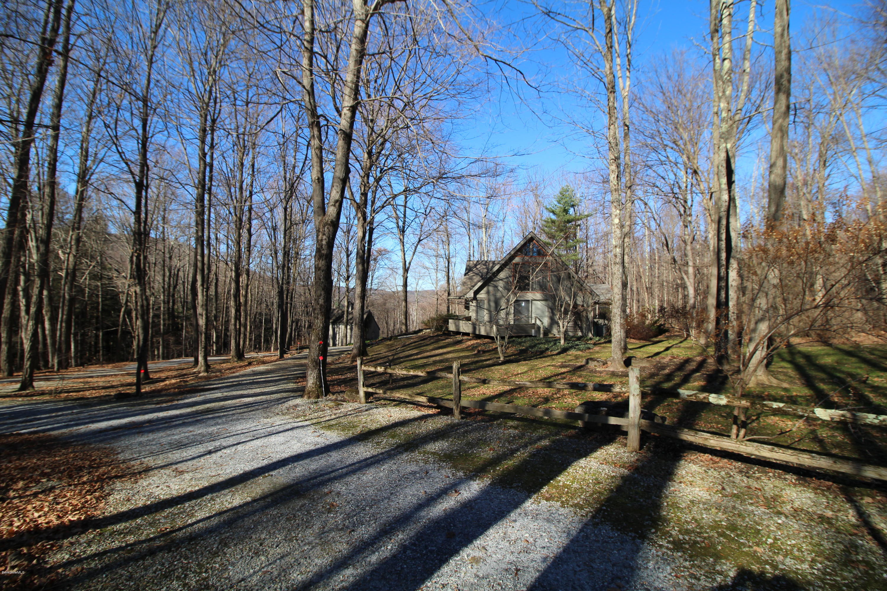 58 Maple Hill Road West Stockbridge, MA 01266 - Photo 2 of 21 a view of a yard with large trees