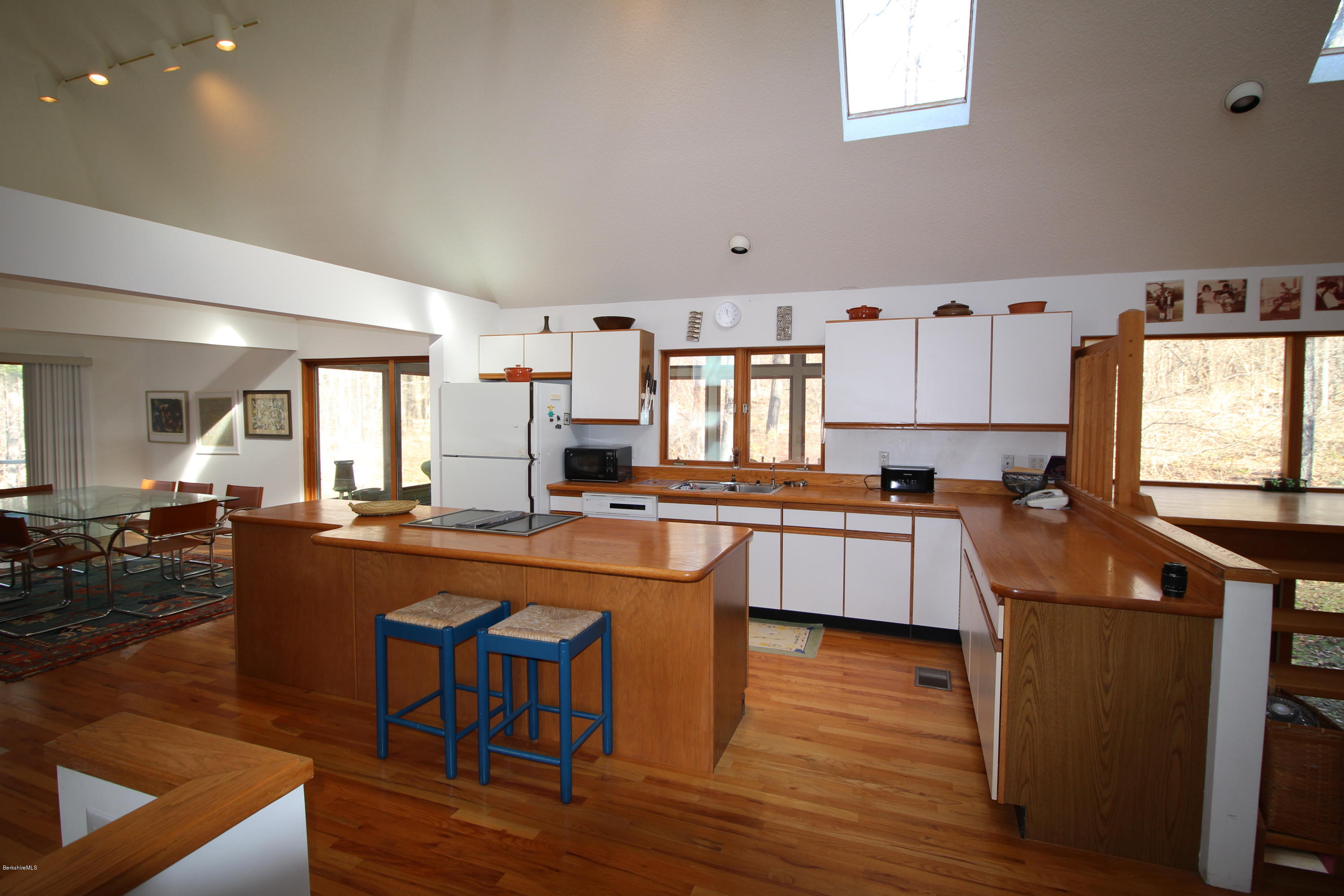 58 Maple Hill Road West Stockbridge, MA 01266 - Photo 13 of 21 a large kitchen with a table and chairs in it