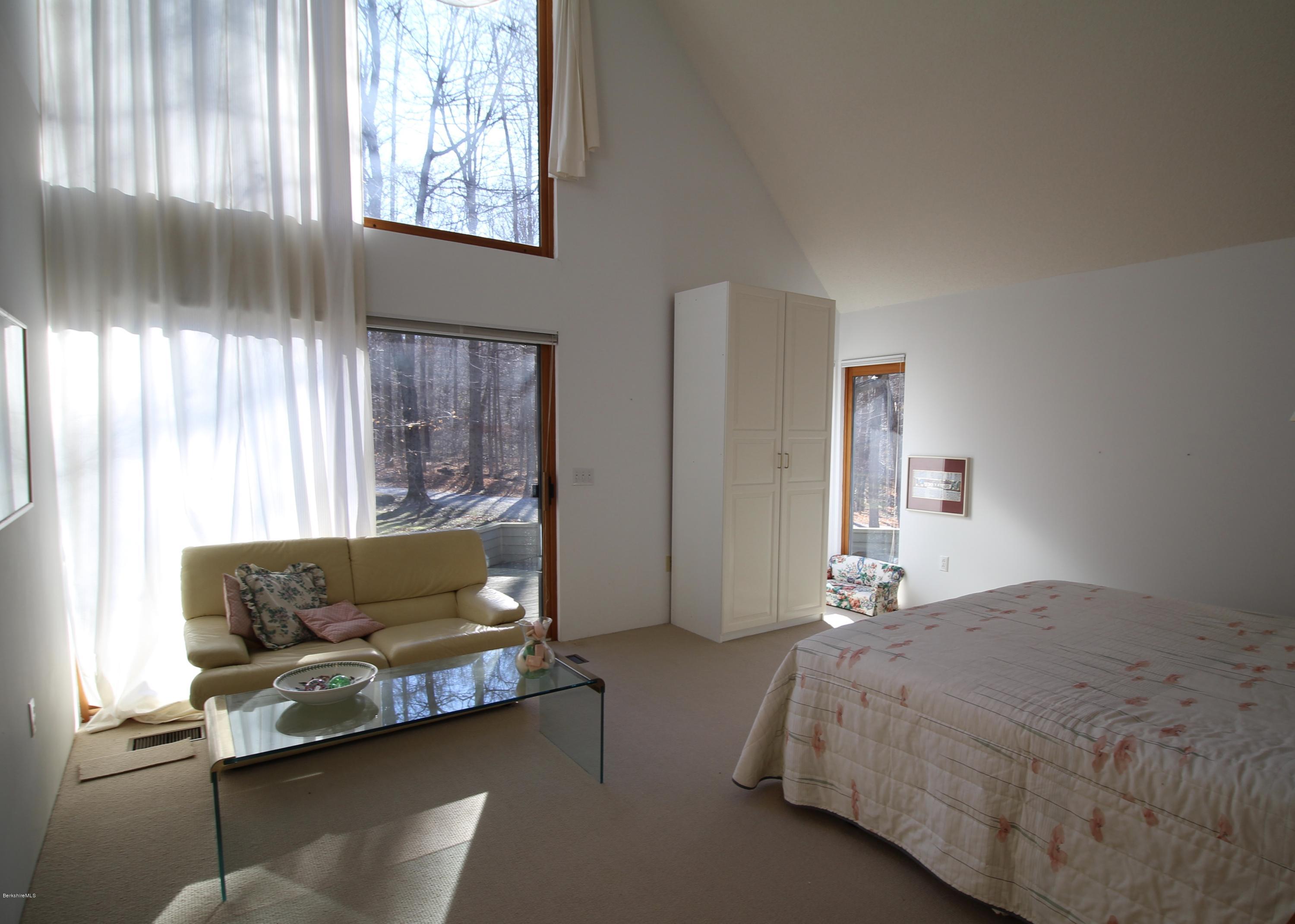 58 Maple Hill Road West Stockbridge, MA 01266 - Photo 14 of 21 a bedroom with a bed and window