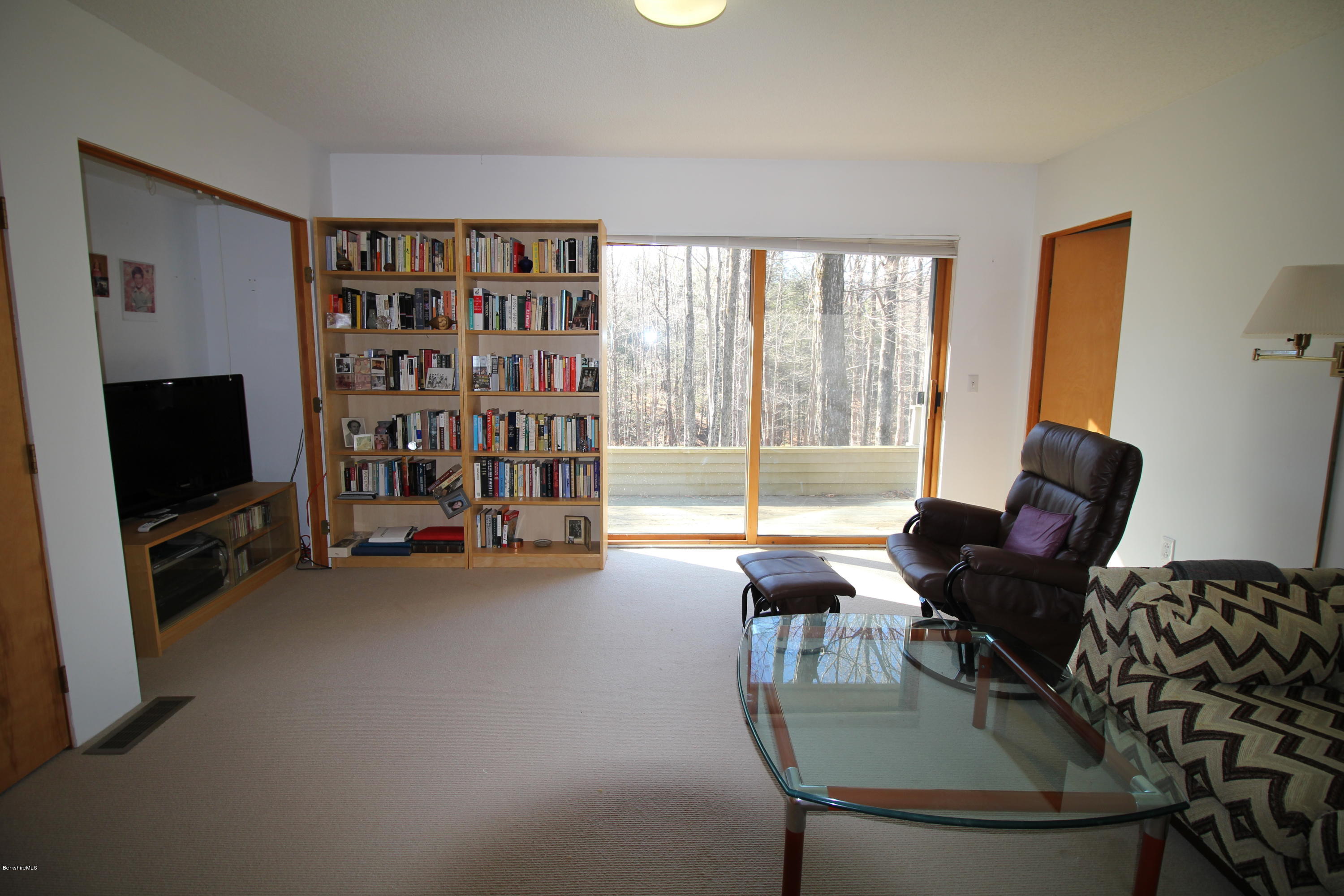 58 Maple Hill Road West Stockbridge, MA 01266 - Photo 16 of 21 a living room with furniture and a flat screen tv