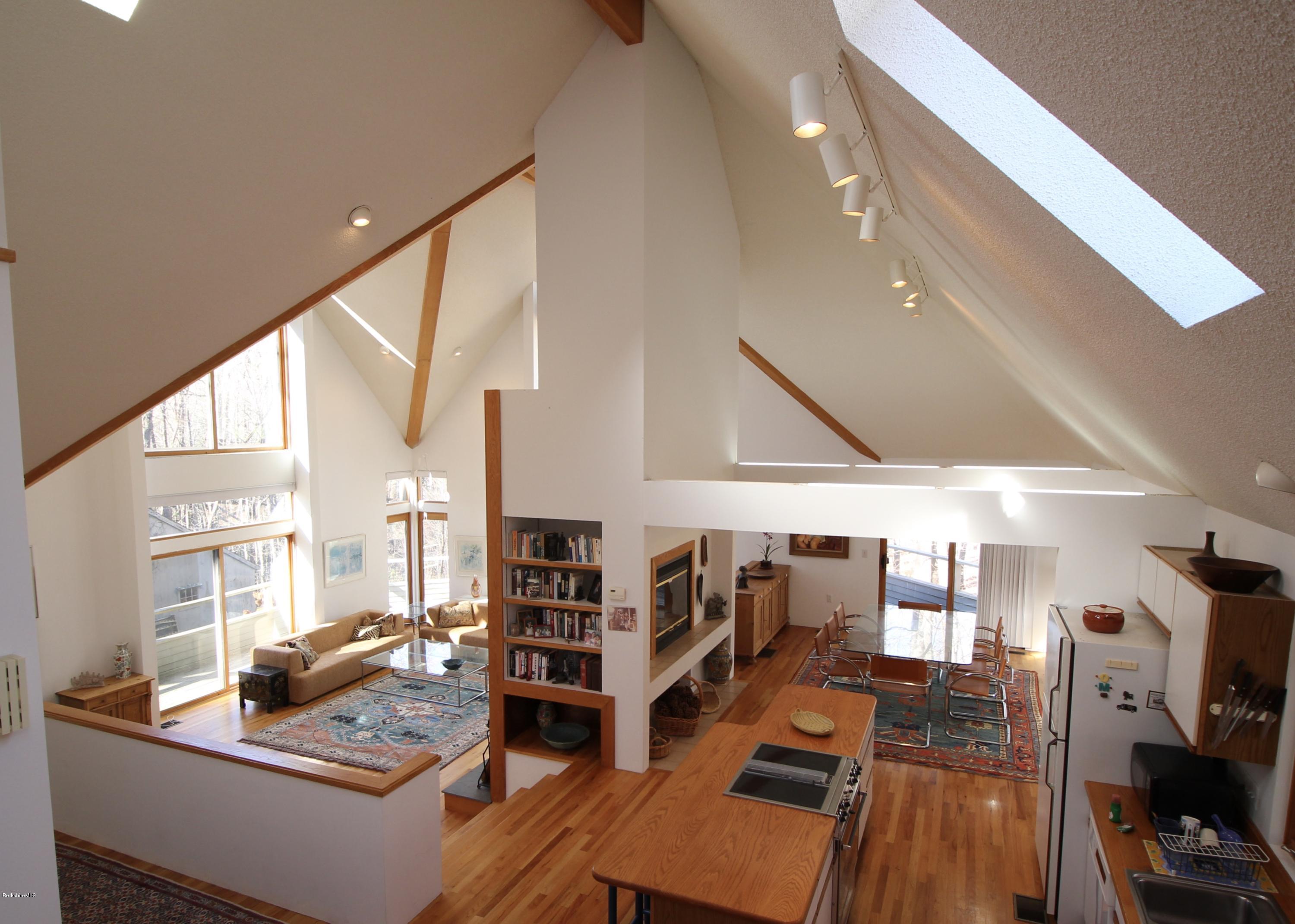 58 Maple Hill Road West Stockbridge, MA 01266 - Photo 7 of 21 a living room with lots of furniture and wooden floor