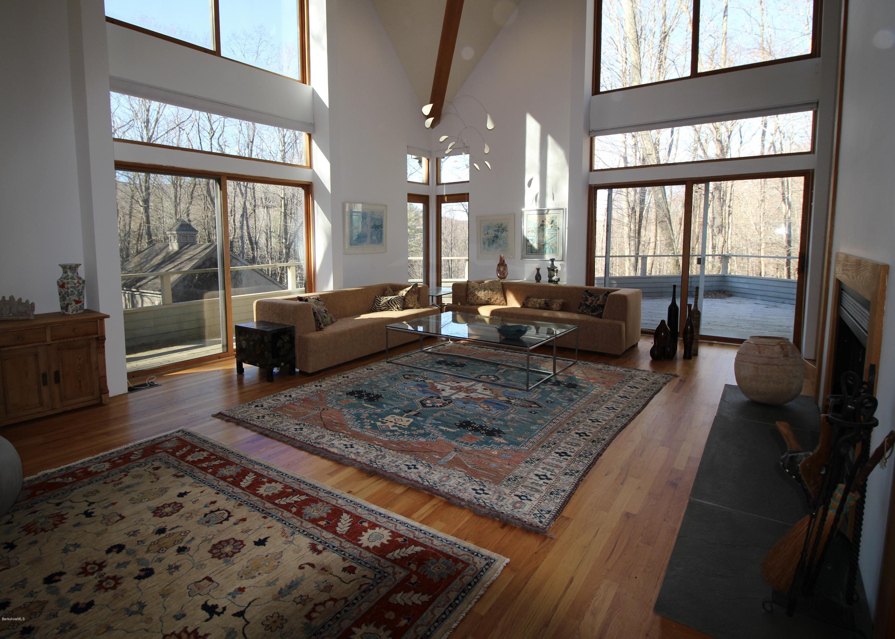 58 Maple Hill Road West Stockbridge, MA 01266 - Photo 8 of 21 a living room with furniture and a rug
