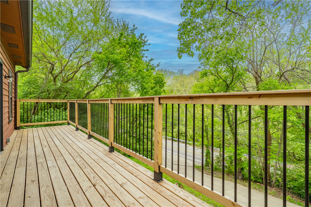 10584 New Biddinger Road Harrison, OH 45030 - Photo 44 of 61 This outdoor deck offers a serene escape, perfect for enjoying the peaceful natural surroundings.