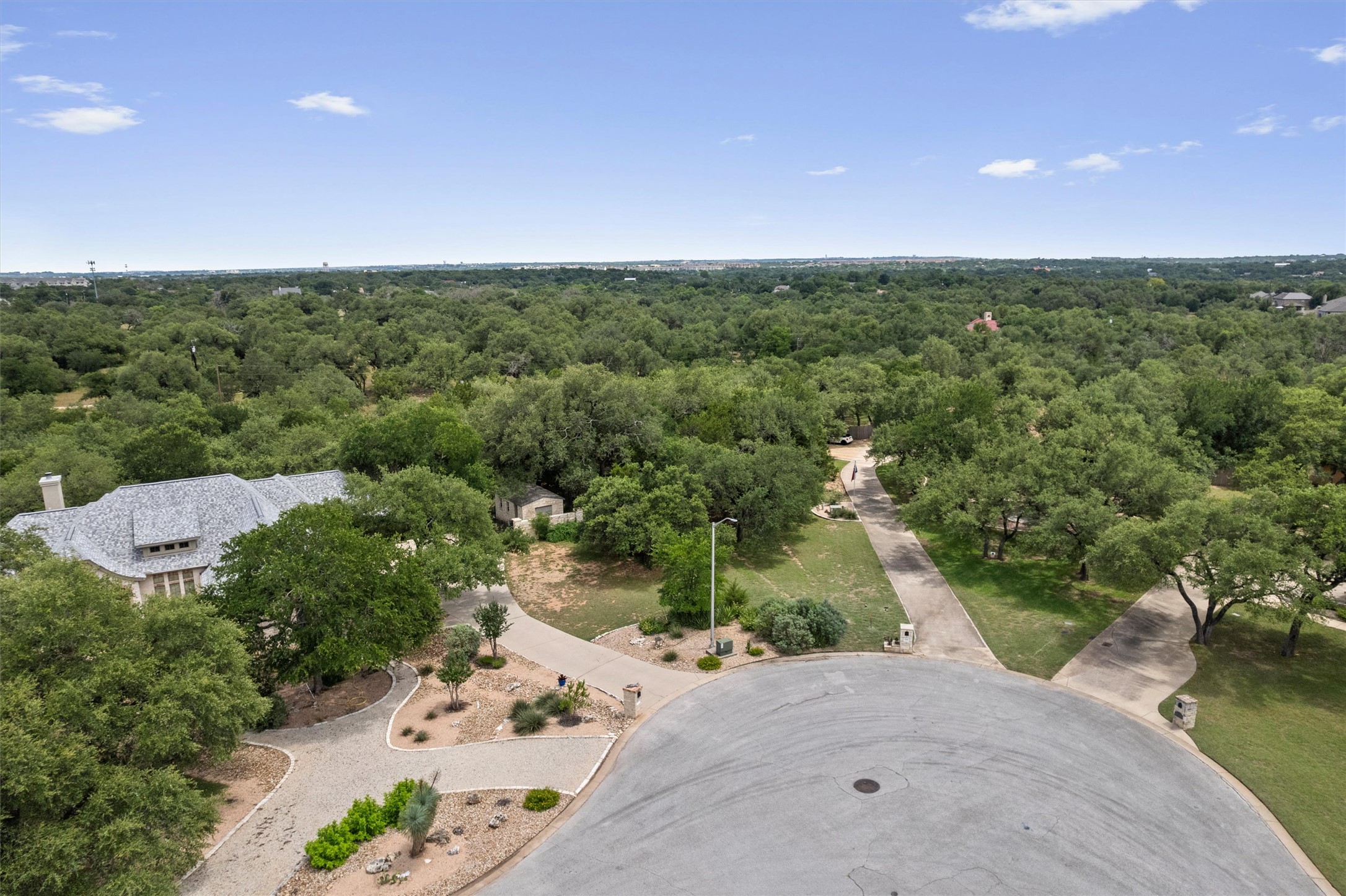 120 East Rustle Cove Georgetown, TX 78628 - Photo 18 of 25 an aerial view of a house with a yard and lake view