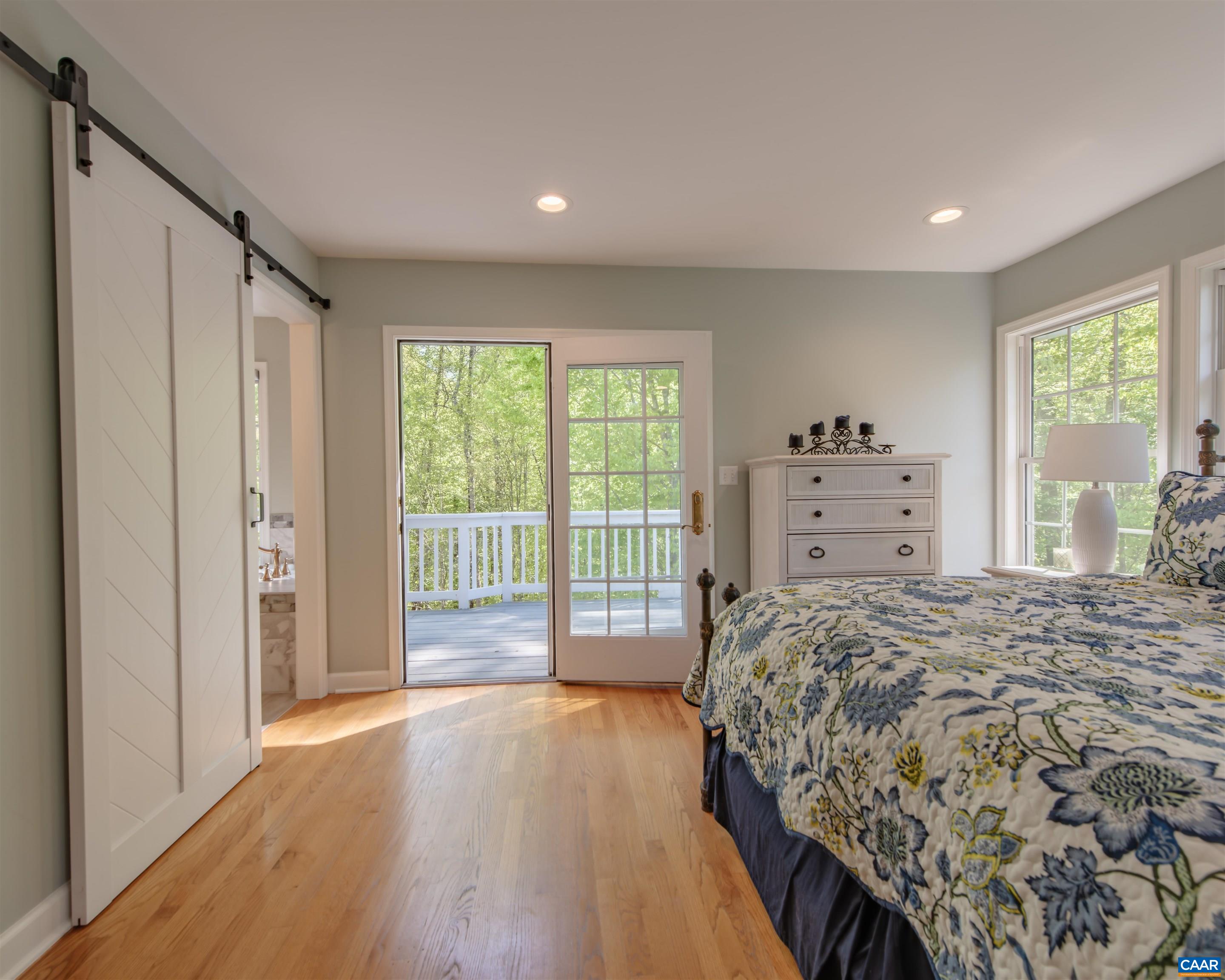1089 Broken Island Road Palmyra, VA 22963 - Photo 40 of 74 a bedroom with a bed and a large window