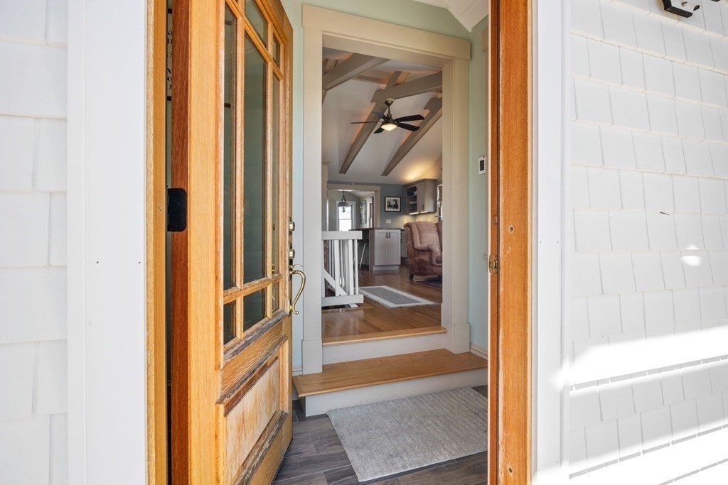 238 Nantasket Road Hull, MA 02045 - Photo 3 of 29 a view of a hallway with a livingroom and furniture