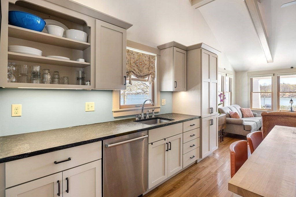 238 Nantasket Road Hull, MA 02045 - Photo 10 of 29 a kitchen with stainless steel appliances granite countertop a sink and cabinets