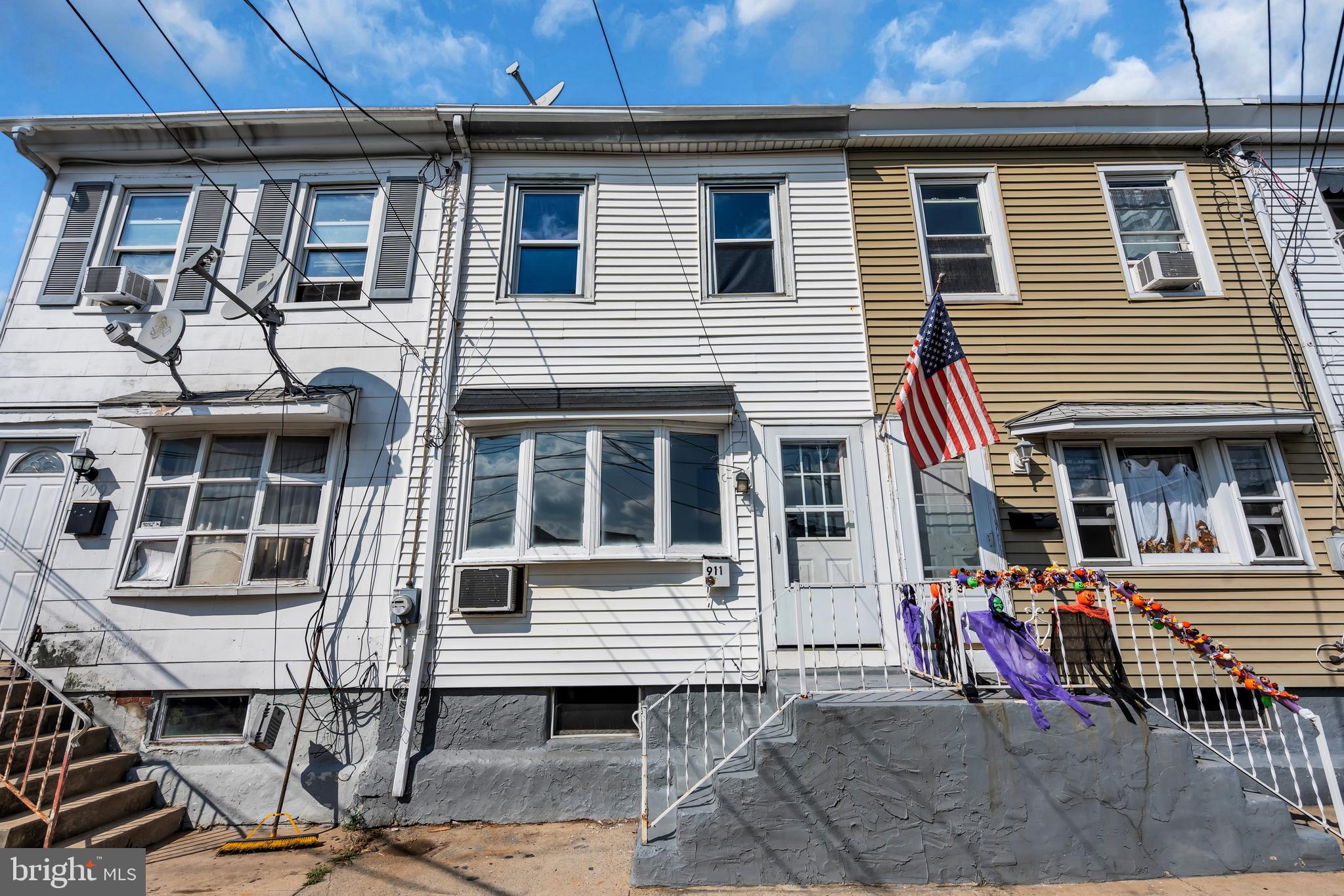 a view of a house with large windows