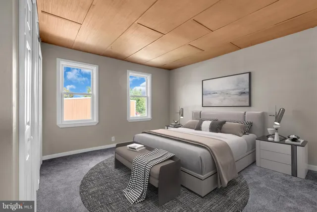 a bedroom with bed and window