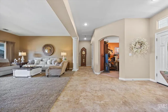 a view of a dining room with furniture window and outside view