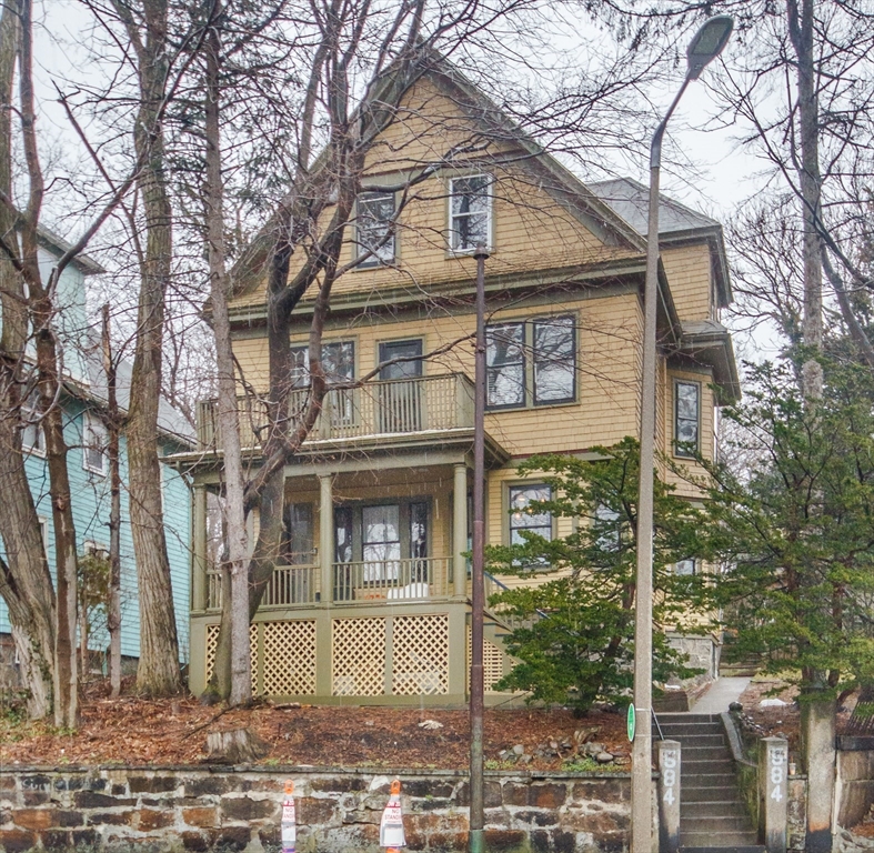 584 Centre Street Boston, MA 02130 - Photo 14 of 29 a front view of a house with garden