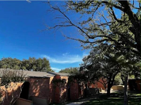a view of yard with outdoor seating