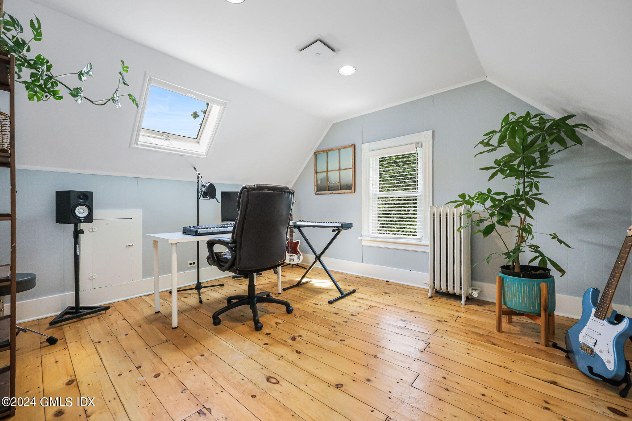 8 Hendrie Avenue Riverside, CT 06878 - Photo 28 of 33 a view of a workspace with furniture and a potted plant
