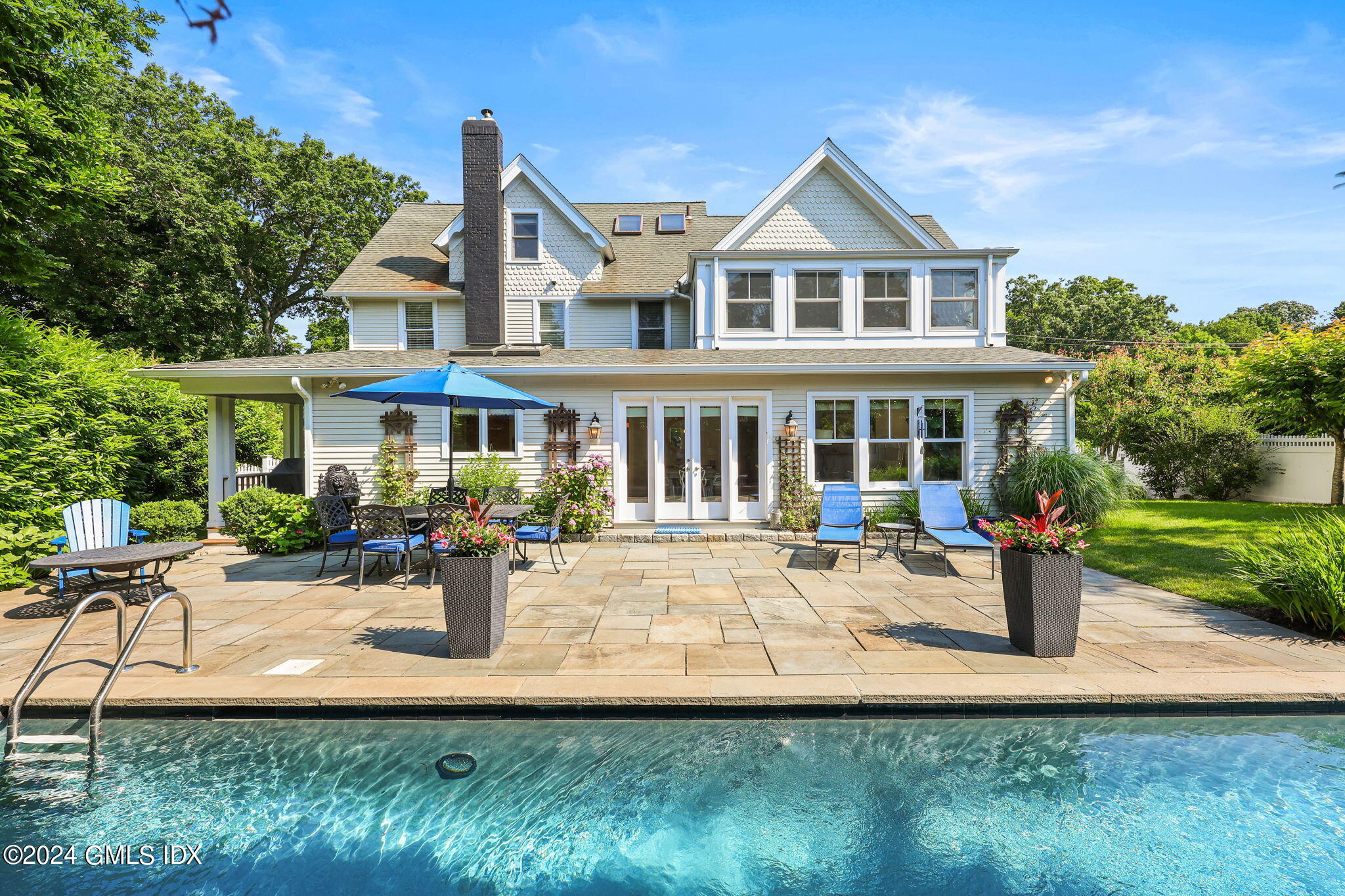 8 Hendrie Avenue Riverside, CT 06878 - Photo 30 of 33 a front view of a house with porch and sitting area