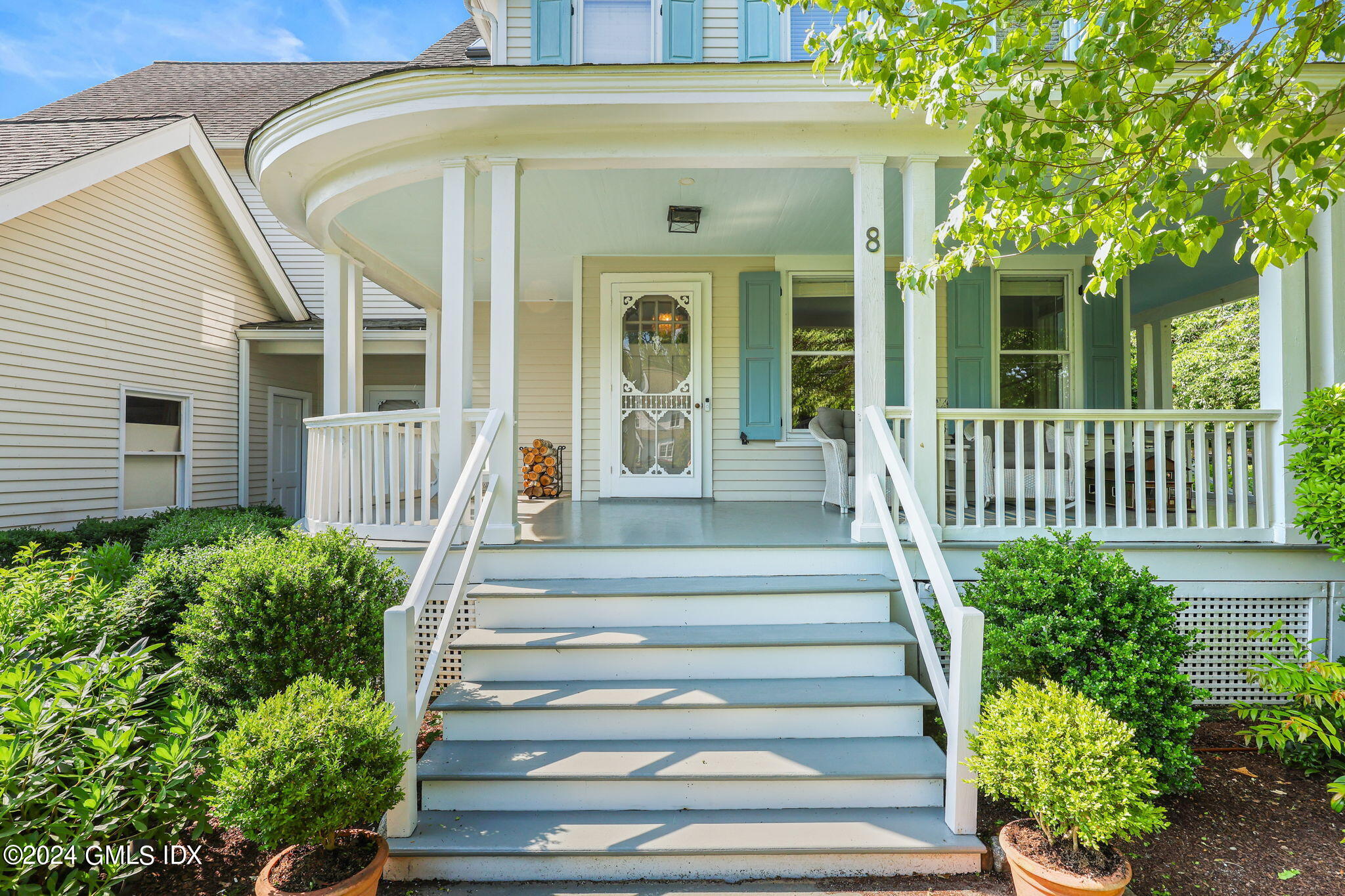 8 Hendrie Avenue Riverside, CT 06878 - Photo 3 of 33 a front view of a house with fountain