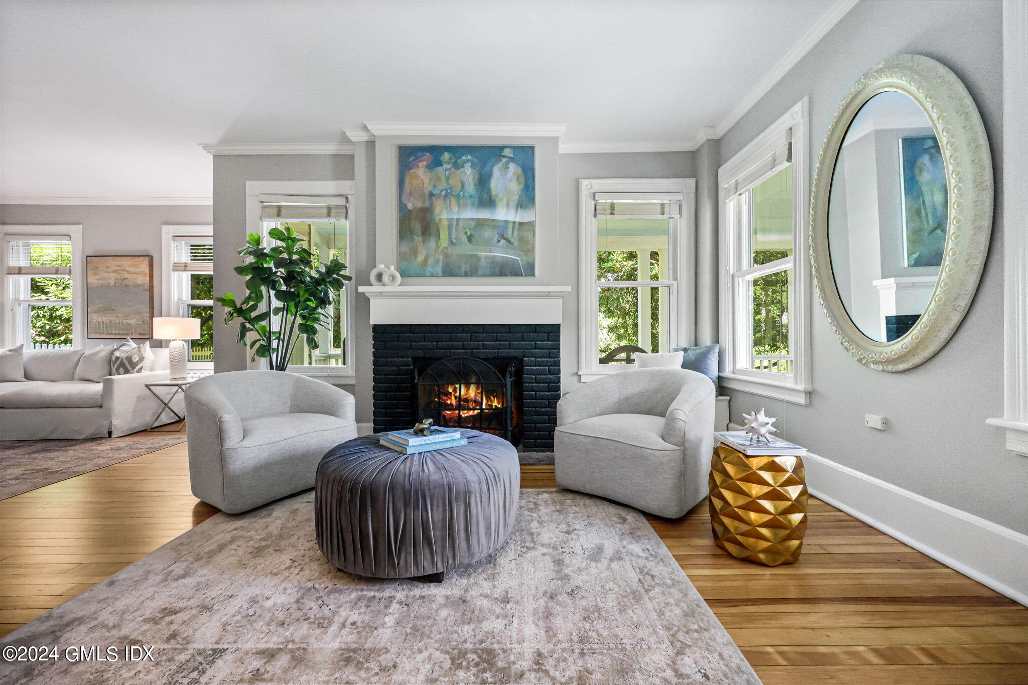 8 Hendrie Avenue Riverside, CT 06878 - Photo 6 of 33 a living room with furniture and a fireplace
