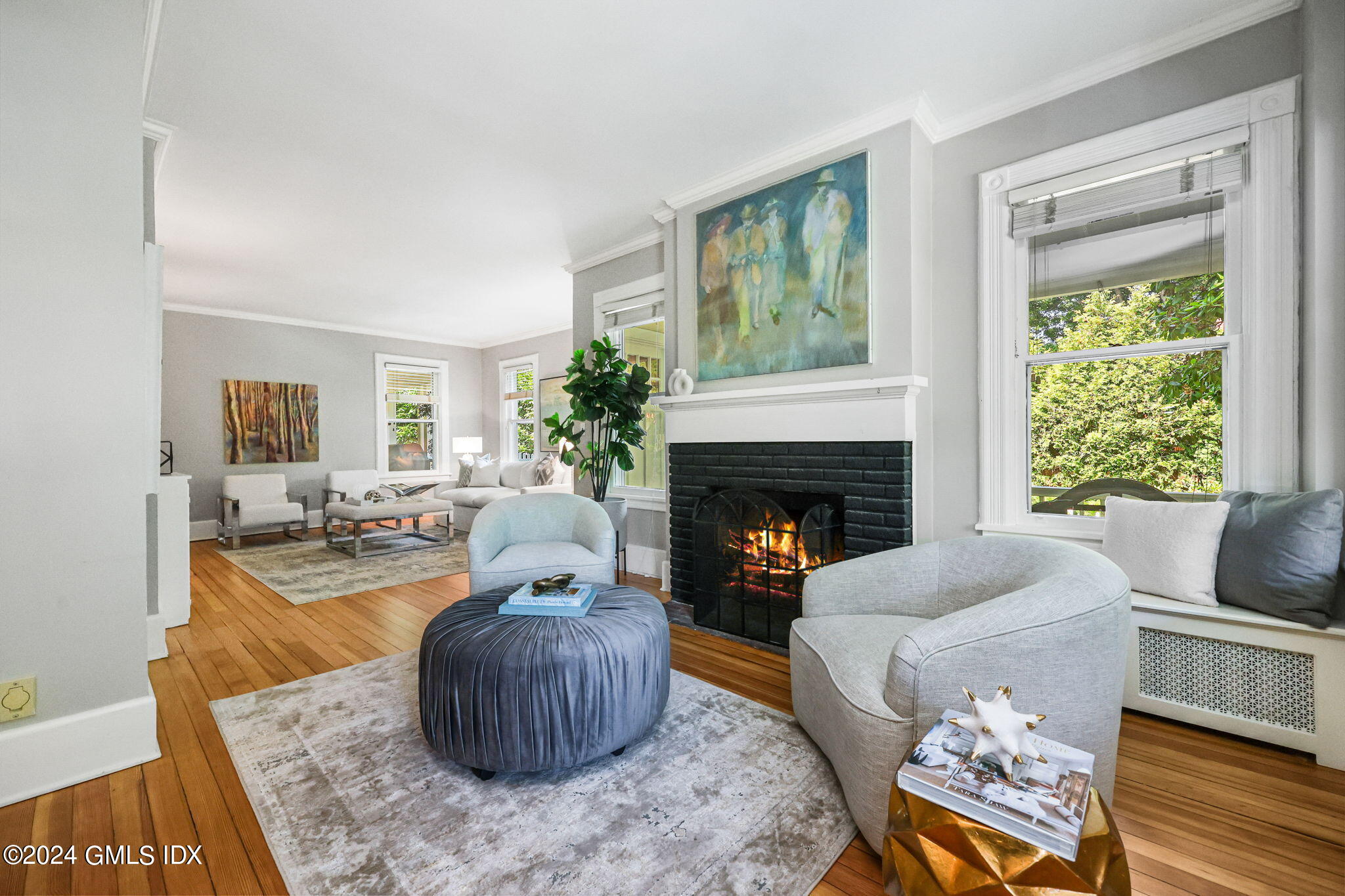 8 Hendrie Avenue Riverside, CT 06878 - Photo 7 of 33 a living room with furniture and a fireplace