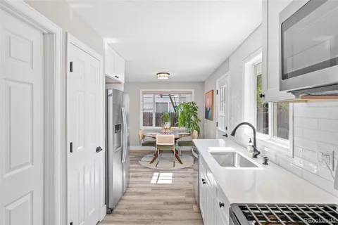 a bathroom with a sink and a window