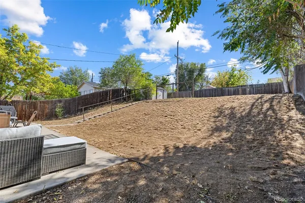 a view of backyard with green space