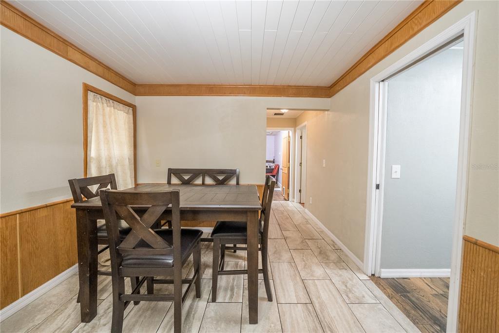 12 Spring Lake Way Ocala, FL 34472 - Photo 15 of 57 a view of a dining room with furniture and window