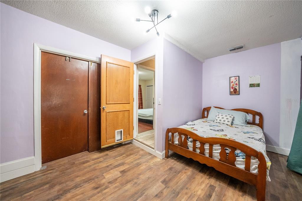 12 Spring Lake Way Ocala, FL 34472 - Photo 26 of 57 a bedroom with a bed and a window